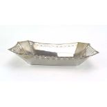A German silver basket of elongated octagonal form with beaded border, w. 27 cm, 10.