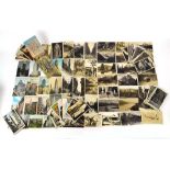 A large collection of photographic postcards relating to the United States and Canada including