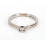 An 18ct white gold ring set princess cut diamond in a four claw setting, stone approximately 0.