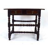 A late 17th century oak side table, the frieze with a single drawer,