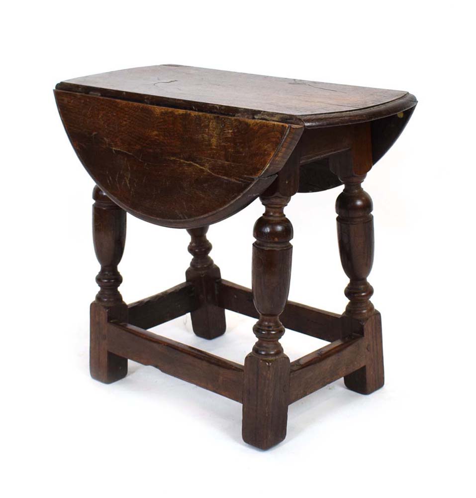 A 17th century and later oak table/joint stool,