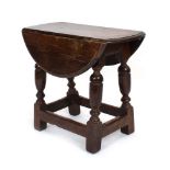 A 17th century and later oak table/joint stool,