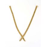 A 9ct yellow gold articulated link necklace with swivel hinge,