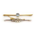 An early 20th century yellow metal bar brooch set seed pearls and small diamonds, w. 5.