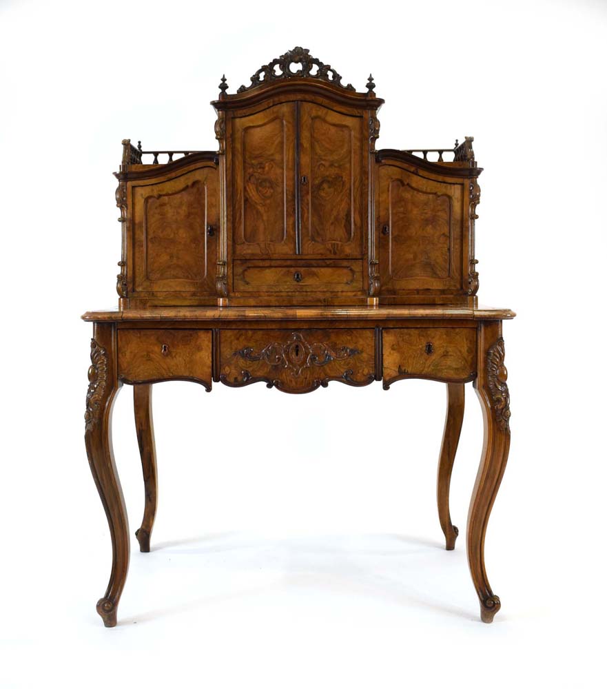 A 19th century French bonheur de jour, or writing table, the superstructure enclosing four drawers,