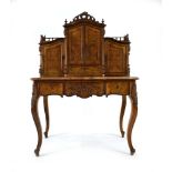 A 19th century French bonheur de jour, or writing table, the superstructure enclosing four drawers,