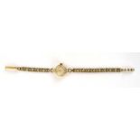 A ladies 9ct yellow gold manual wind wristwatch by Omega,