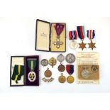 Walton Family Collection: a cased silver MBE medal,