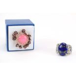 Two Giuseppe Perez cocktail rings including a pink jade and garnet cascade ring,