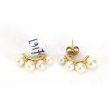 A pair of 9ct yellow gold ear studs of half hoop design, each set four graduated cultured pearls, l.