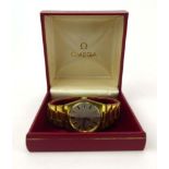 A gentleman's gold plated automatic wristwatch by Omega,