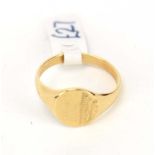 A 9ct yellow gold signet ring of heart shaped design, ring size F 1/2, 1.