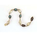 An 18ct yellow gold wirework bracelet set baroque pearls and hardstone, l. 20.