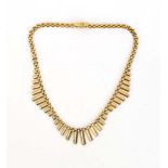 A 9ct yellow gold fringe-type brick link necklace, 20.