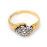 A 9ct yellow gold cluster ring set sixteen small diamonds in a diamond shaped setting, ring size L,
