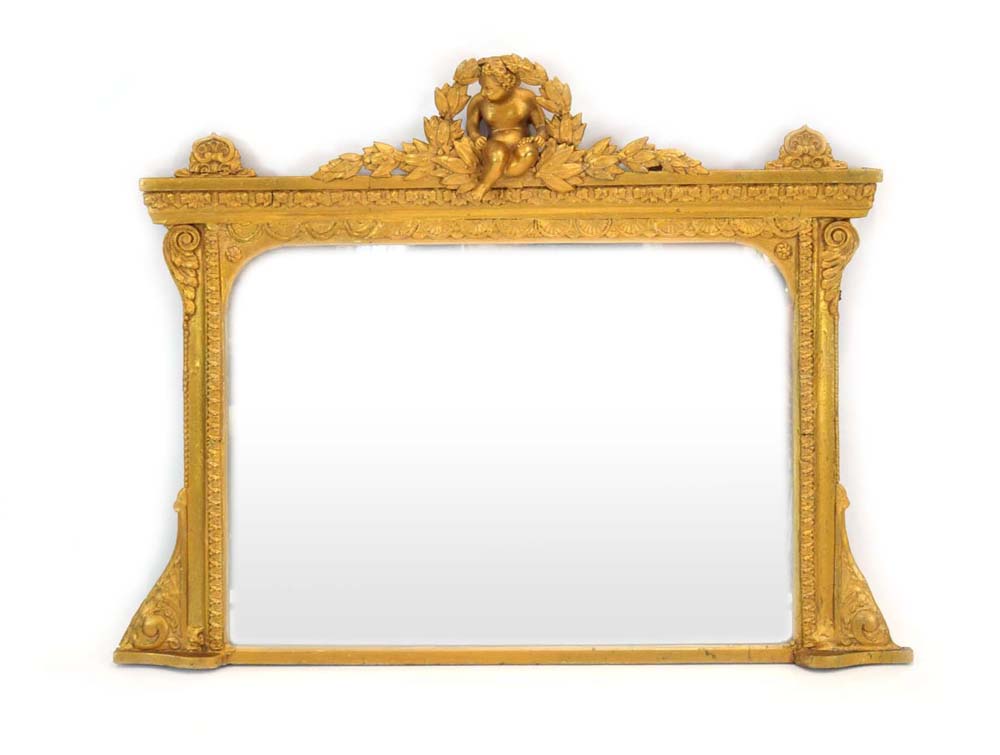 A George III and later giltwood overmantle mirror surmounted by a cherub and swag pediment,