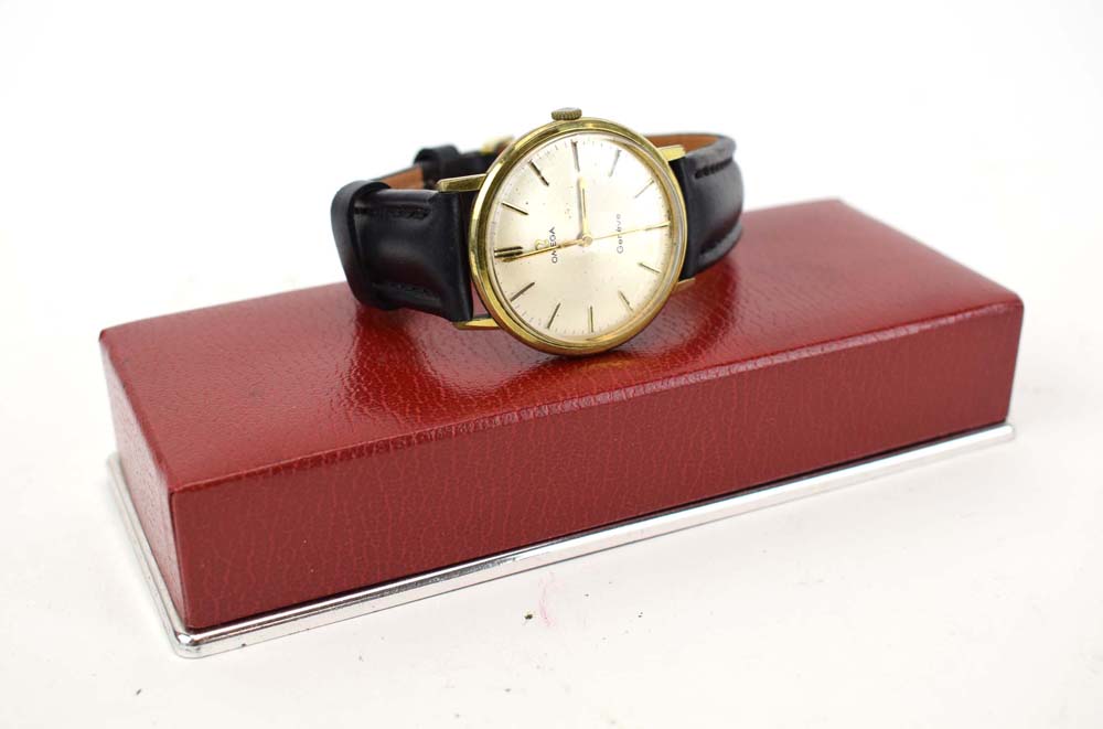 A gentleman's gold plated manual wind wristwatch by Omega,