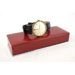 A gentleman's gold plated manual wind wristwatch by Omega,
