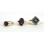 A 14ct yellow gold ring set oval alexandrite-type stone, together with two further dress rings,