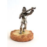 A continental metalware figure in the form of a fiddler, h.
