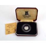 A Pobjoy Mint platinum Isle of Man tenth noble proof coin dated 1984,