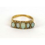 A 19th century-style 9ct yellow gold ring set five graduated opals interspersed with small diamonds,