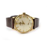 A gentleman's 9ct yellow gold automatic wristwatch by Omega,