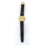 A gentleman's 9ct gold manual wind wristwatch by Omega,