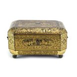 A Chinese Export gilt decorated lacquered sewing box of canted form with carved bone fitments and