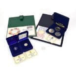 Pobjoy Mint, a set of three silver proof crowns and two £1 coins, all cased and with certificates,