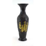 A Chinese brown patinated vase of slender baluster form, gilt decorated with females at leisure,