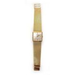 A 9ct yellow gold manual wind 'De Luxe' wristwatch by Record,