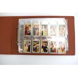 An album of Gallahers and Players cigarette cards including Famous Film Scenes (48),