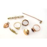 A mixed parcel of yellow gold and yellow metal jewellery including a diamond set stick pin,