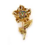 Cartier, an 18ct yellow gold 'open and shut' en tremblant flower clip,