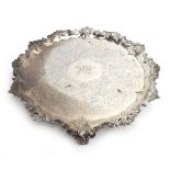 ***WITHDRAWN FROM SALE*** A George III silver salver of circular form with chased foliate border on