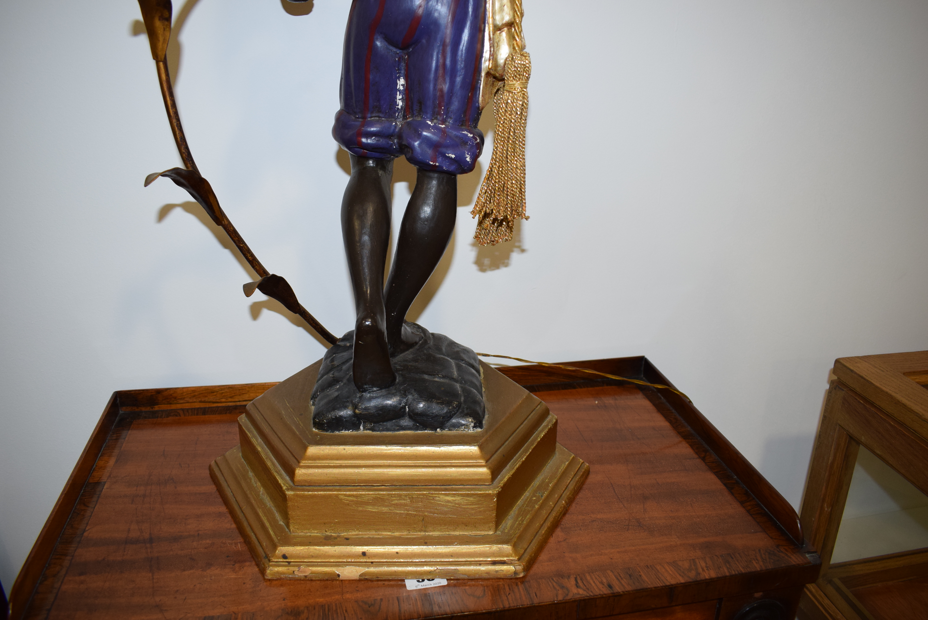 A polychrome and metalwork 'blackamoor' lamp modelled as a young man holding a five-branch foliate - Image 3 of 13