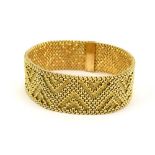 Joseph Marchak, an 18ct yellow gold articulated link bracelet with zig-zag design,
