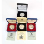 Royal Mint, three silver proof commemorative crowns and a London Mint proof crown,