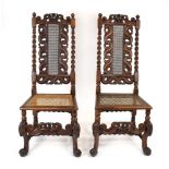 A pair of late 17th century walnut and bergere side chairs with bobbin turned supports, carved legs,