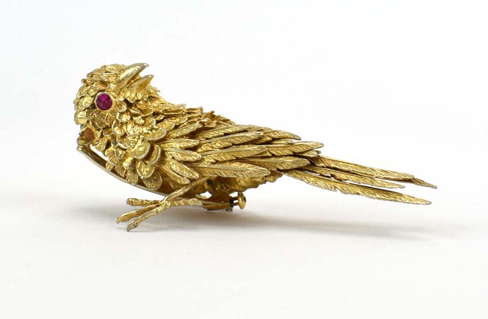 Jean-Claude Champagnat for Mecan Elde, a yellow metal clip in the form of a sparrow,