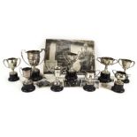 Of Angling Interest: Four silver trophies, five silver plated trophies,