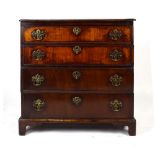 An early 18th century walnut chest, the chamfered surface over four long drawers on bracket feet, w.