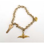 A 9ct yellow gold circular link bracelet suspending three charms including a pair of RAF wings,