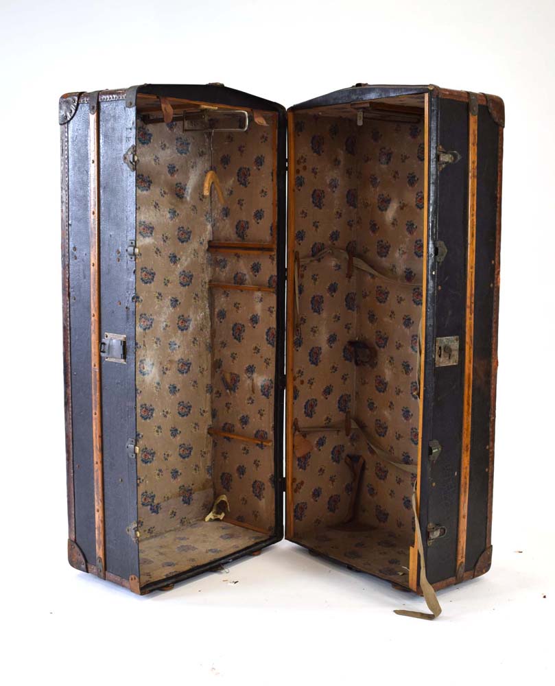 An early 20th century leather and beech bound gentleman's standing trunk, h.