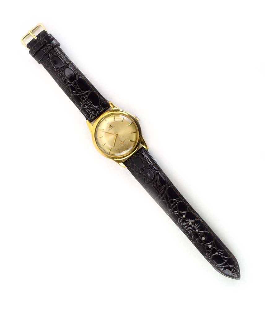 A gentleman's gold plated manual wind wristwatch by Omega,