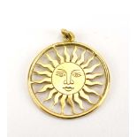 A 1970's 18ct yellow gold pendant of sun shaped form, marked verso RH within a hexagon, d. 2.