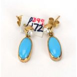 A pair of yellow metal ear pendants, each set a small cultured pearl and oval cabochon turquoise, l.