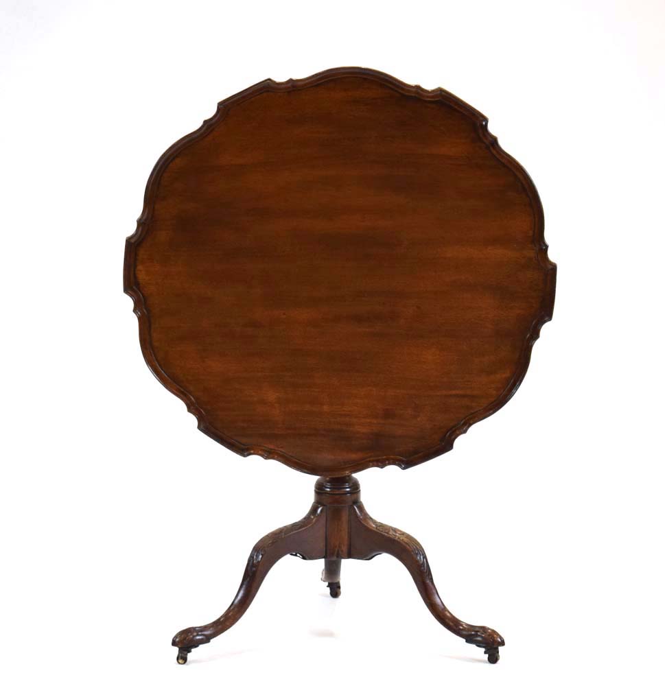 A George III and later mahogany tilt-top table,