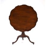 A George III and later mahogany tilt-top table,